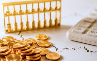 如何确定金一福黄金的价格标准？这个标准如何影响市场交易？